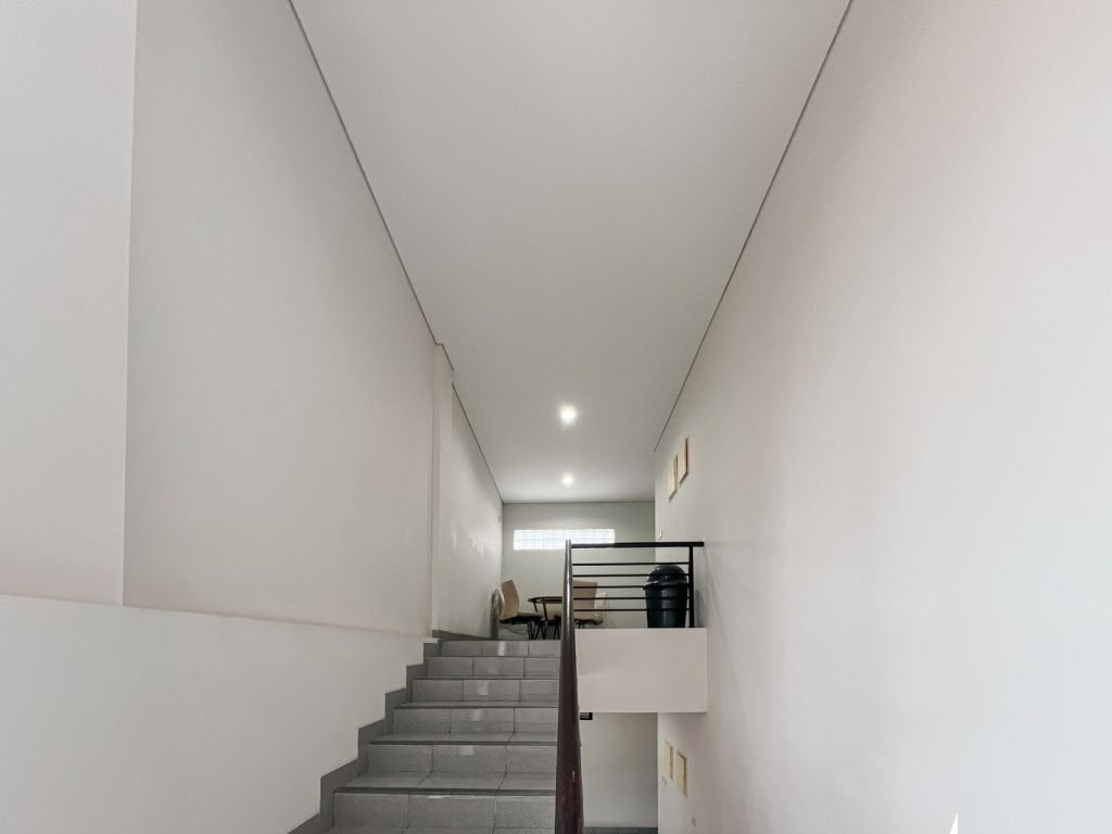 A concrete staircase and landing at Arcelon Premiere