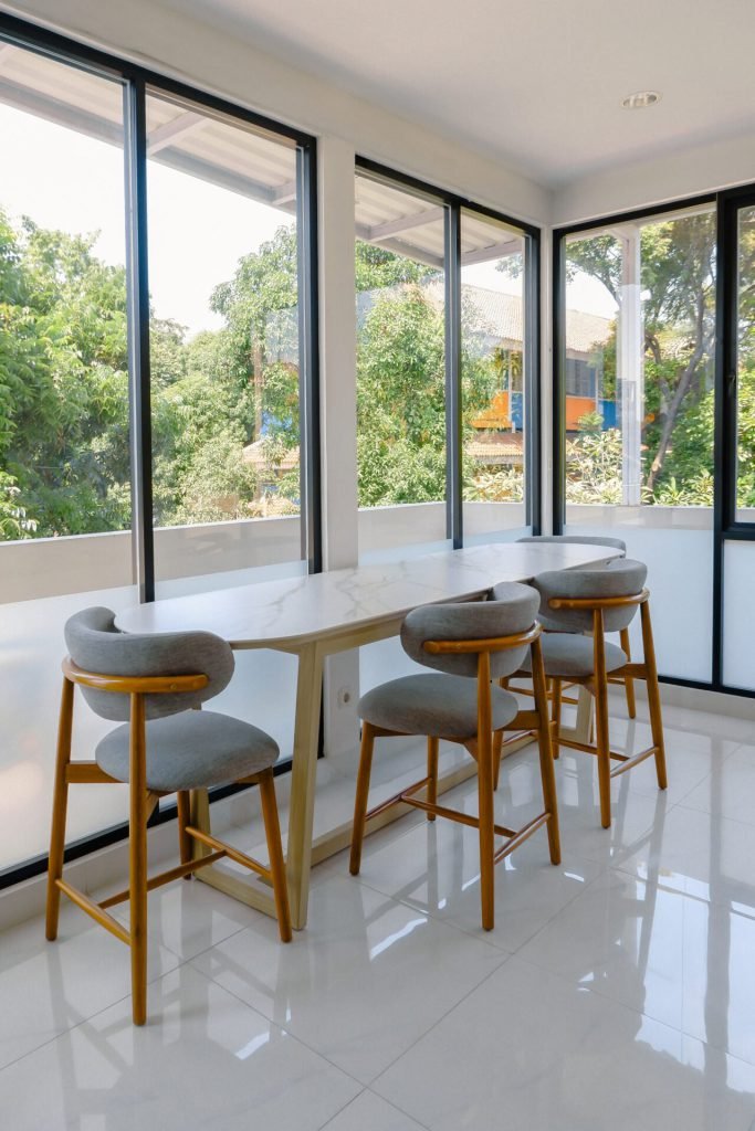 The rooftop coffee lounge at Arcelon Executive with a marble counter and bar stools