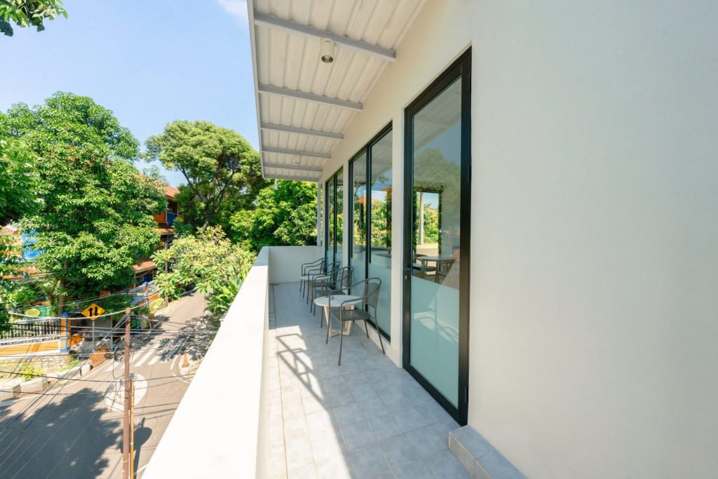 The rooftop terrace walkway at Arcelon Executive, overlooking the neighbourhood