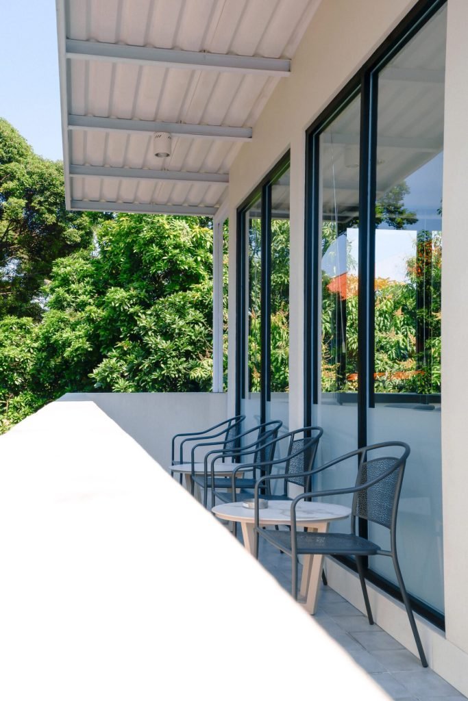 Outdoor seating on the rooftop terrace at Arcelon Executive