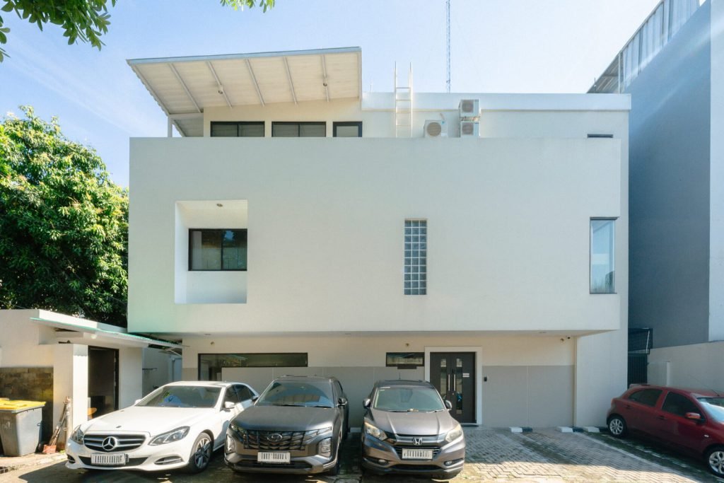 The frontage of Arcelon Executive in Bendungan Hilir with cars in the forecourt