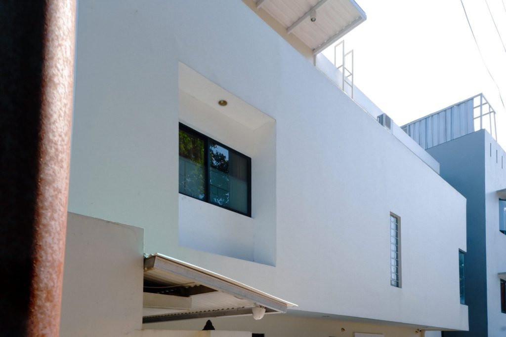 Detail of the exterior wall and window of Arcelon Executive