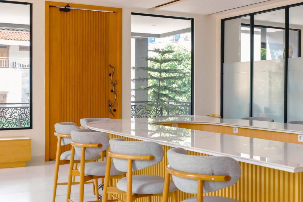 Bar stools at the marble counter in the coffee lounge at Arcelon Premiere